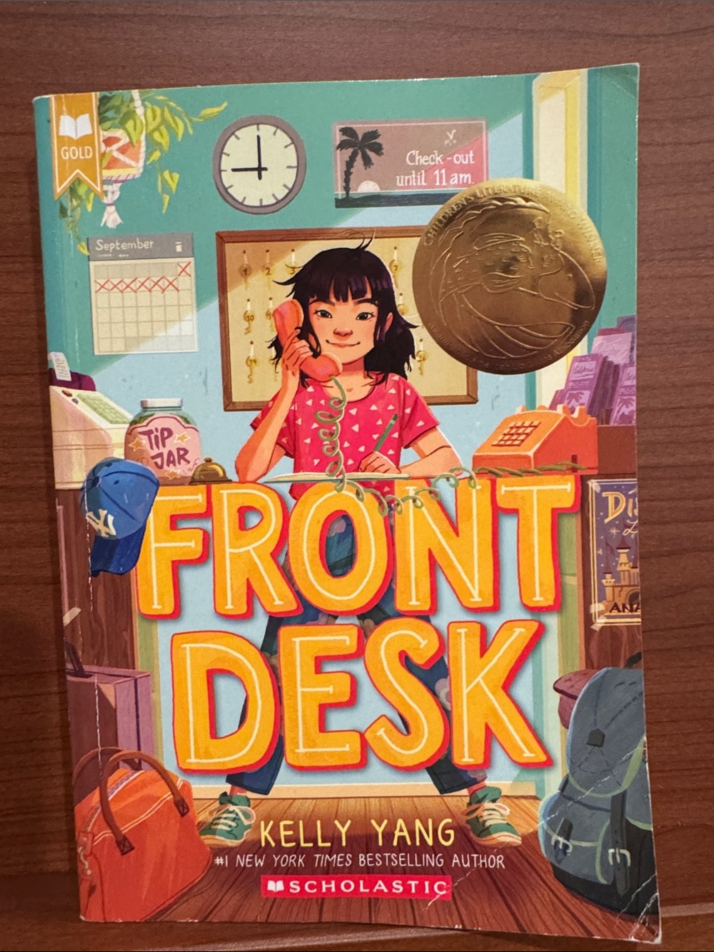 Scholastic Front Desk - Teal, Orange, Yellow Illustrated Cover